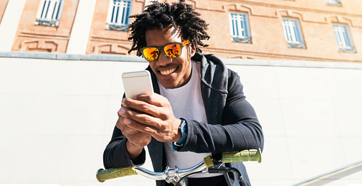A person on their bike looking at how eDcoments helps them stay organized.