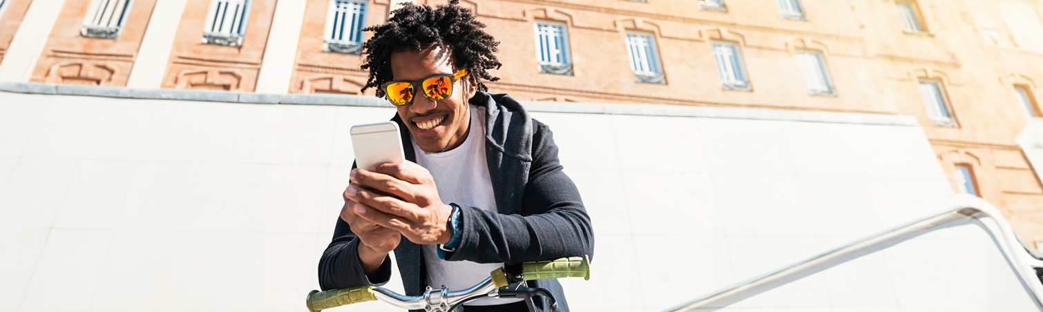 A person on their bike looking at how eDcoments helps them stay organized.