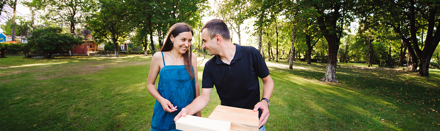 A couple celebrate Labor Day weekend with some fun outdoor games.